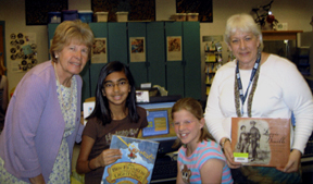 Photograph of Virginia, Sherry, and Students