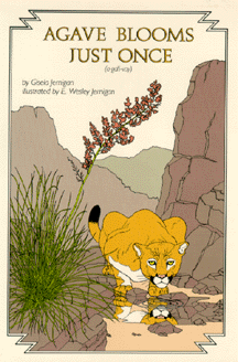 The book jacket shows a bobcat crouching in a rocky wash.