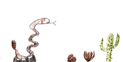 This is a picture of a rattlesnake on a rock, next to a cactus.