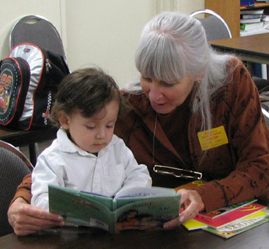 Judi reading with 