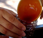 Pouring syrup into jar